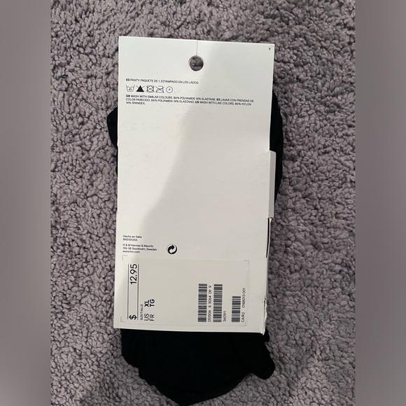 Three pairs of H&M black tights (XL) - animal print, sparky and tribal design - Picture 3 of 7
